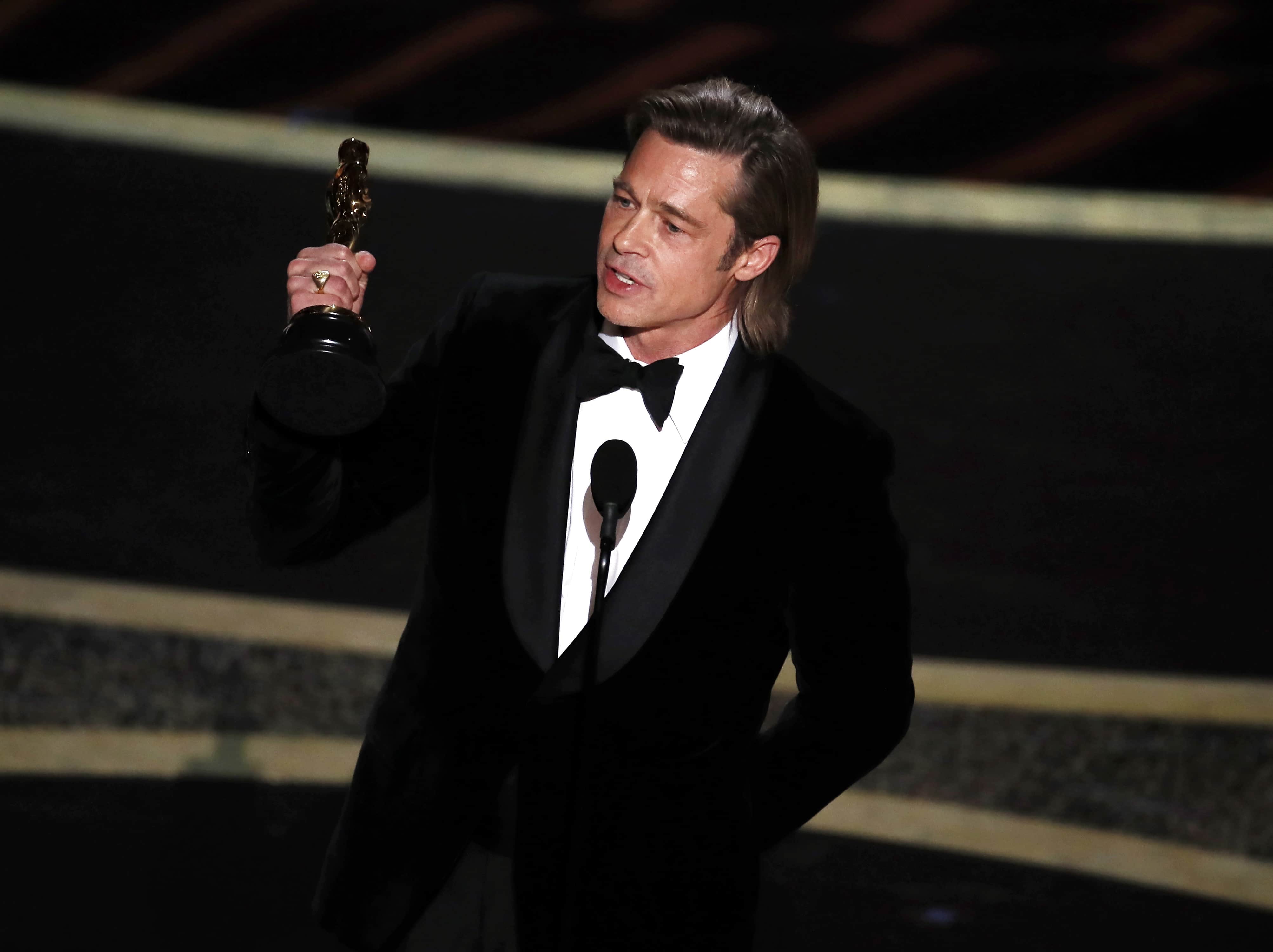 Brad_Pitt_takes_home_first_acting_Oscar.jpg