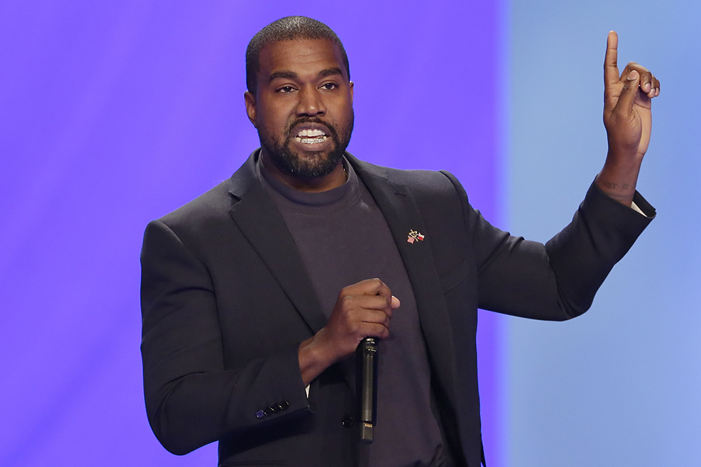 FILE - In this Sunday, Nov. 17, 2019, file photo, Kanye West answers questions during a service at Lakewood Church, in Houston. On Friday, Oct. 16, 2020, The Associated Press reported on stories circulating online incorrectly asserting that election results in Kentucky show the rapper and independent presidential candidate is ahead of President Donald Trump and Democratic nominee Joe Biden in the presidential race. West tweeted mock election data that the AP provides to customers as part of routine testing ahead of elections. (AP Photo/Michael Wyke, File)