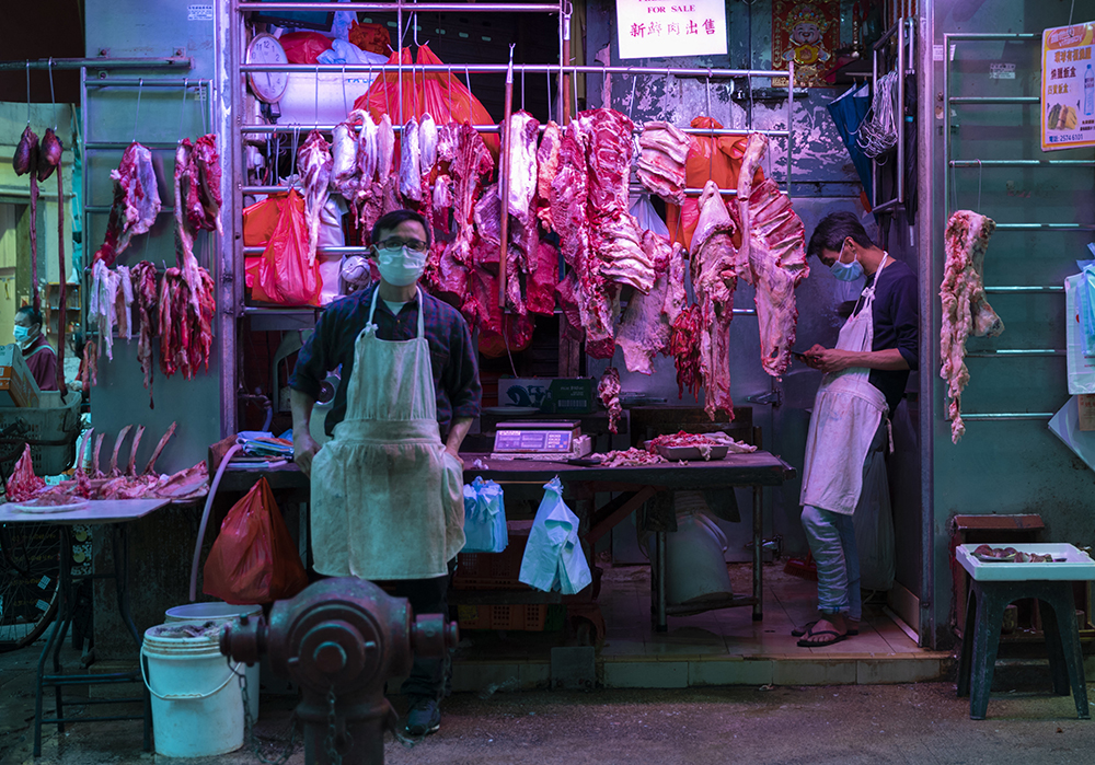 People wearing protective masks seen at the wet market. Financial Secretary Paul Chan has announced today at that the government spending forecast to exceed revenue by HK$139 billion in 2020-21, deficit predicted for six years in a row Hong Kong, China, February 26, 2020. Photo by May James/ABACAPRESS.COM.