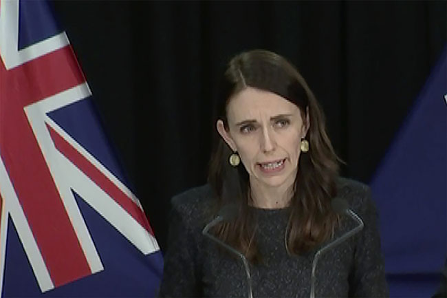 In this image from a video, New Zealand Prime Minister Jacinda Ardern speaks at a news conference in Wellington, New Zealand Tuesday, Aug. 11, 2020. Ardern said Tuesday that authorities have found four cases of the coronavirus in one Auckland household from an unknown source, the first reported cases of local transmission in the country in 102 days. (TVNZ via AP)
