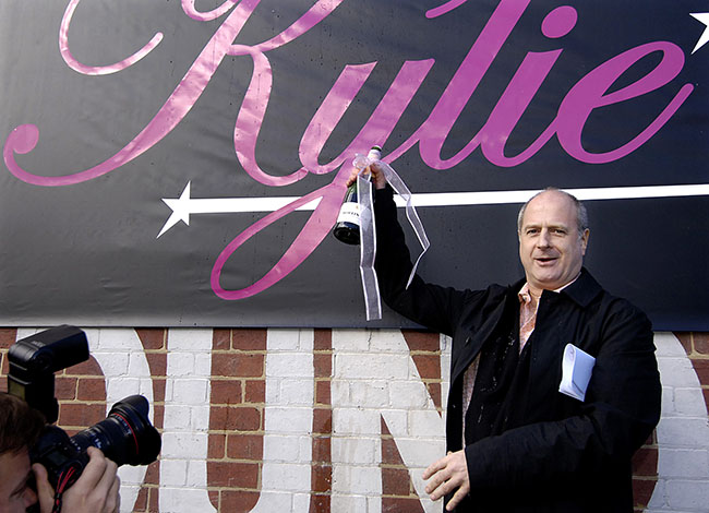 *File image* Frontier Touring Company managing director Michael Gudinski makes an announcement about Kylie Minogue's Australian Showgirl Tour in Melbourne, Thursday, June 22, 2005. Michael Gudinski, a towering figure in Australia's music industry and the founder of Mushroom Records, has died suddenly aged 68. (AAP Image/Martin Philbey) NO ARCHIVING