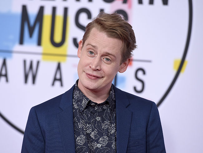 Macaulay Culkin arrives at the American Music Awards on Tuesday, Oct. 9, 2018, at the Microsoft Theater in Los Angeles. (Photo by Jordan Strauss/Invision/AP)