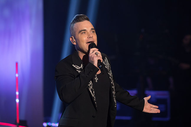 Robbie Williams performs during the filming for the Graham Norton Show at BBC Studioworks 6 Television Centre, Wood Lane, London, to be aired on BBC One on Friday evening. Picture date: Thursday December 19, 2019. Photo credit should read: PA Images on behalf of So TV.