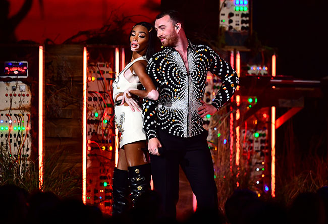 Winnie Harlow and Sam Smith on stage at the Brit Awards 2019 at the O2 Arena, London.. Picture date: Wednesday February 20, 2019. See PA story SHOWBIZ Brits. Photo credit should read: Victoria Jones/PA Wire. EDITORIAL USE ONLY.