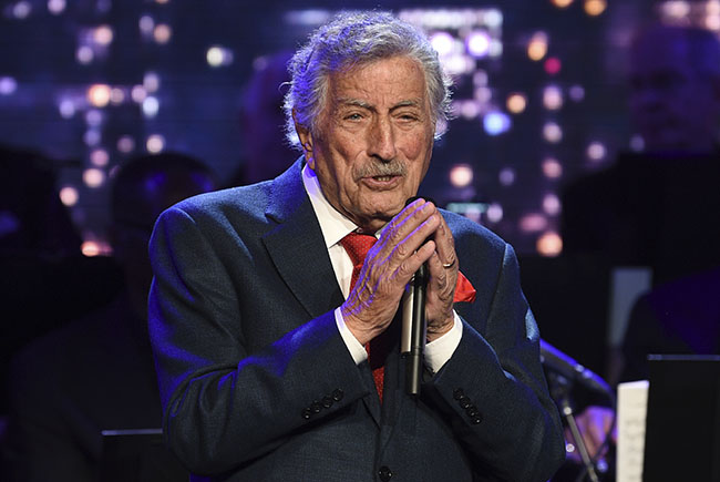FILE - Singer Tony Bennett performs at the Statue of Liberty Museum opening celebration in New York on May 15, 2019. Bennett has been diagnosed with Alzheimer&rsquo;s disease but the diagnosis hasn&rsquo;t quieted his legendary voice. The singer&rsquo;s wife and son reveal in the latest edition of AARP The Magazine that Bennett was first diagnosed in 2016.  (Photo by Evan Agostini/Invision/AP, File)