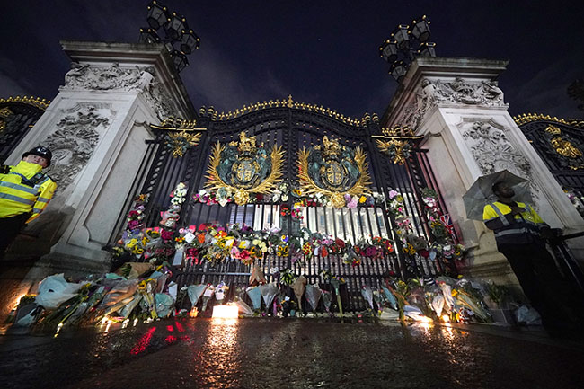 Floral tributes left outside Buckingham Palace in central London, following the announcement of the death of Queen Elizabeth II.. Picture date: Thursday September 8, 2022. See PA story Death Queen. Photo credit should read: Yui Mok/PA Wire