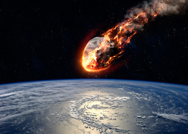 A Meteor glowing as it enters the Earth's atmosphere. Elements of this image furnished by NASA