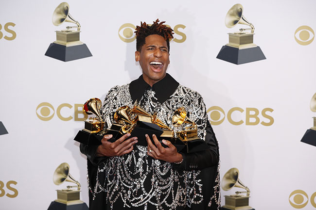 epa09869501 Jon Batiste poses in the press room with his Grammys for Best American Roots Song 'Cry', Best American Roots Performance 'Cry', for Best Music Video 'Freedom', Best Score Soundtrack for Visual Media 'Soul', during the 64th annual Grammy Awards at the MGM Grand Garden Arena in Las Vegas, Nevada, USA, 03 April 2022.  EPA/ETIENNE LAURENT